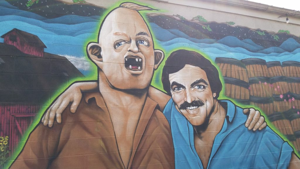 Tom and Sloth mural at craft brewery Burial Beer Co