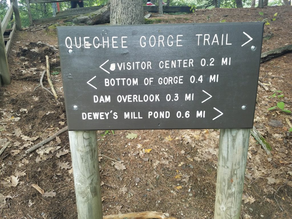 Quechee Gorge trail sign on a summer trip to woodstock, vermont.
